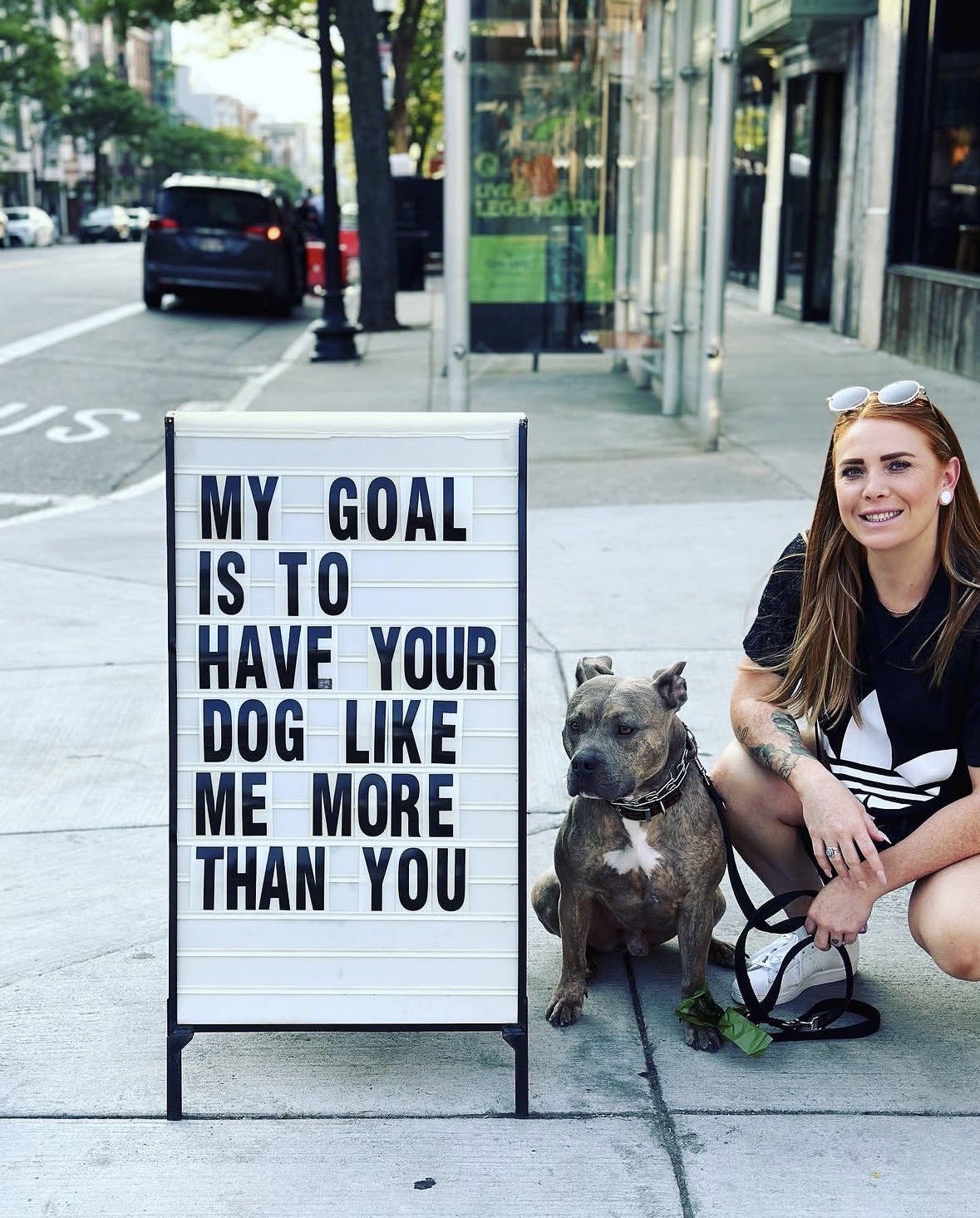 Jenna Spaulding with a freshly groomed dog